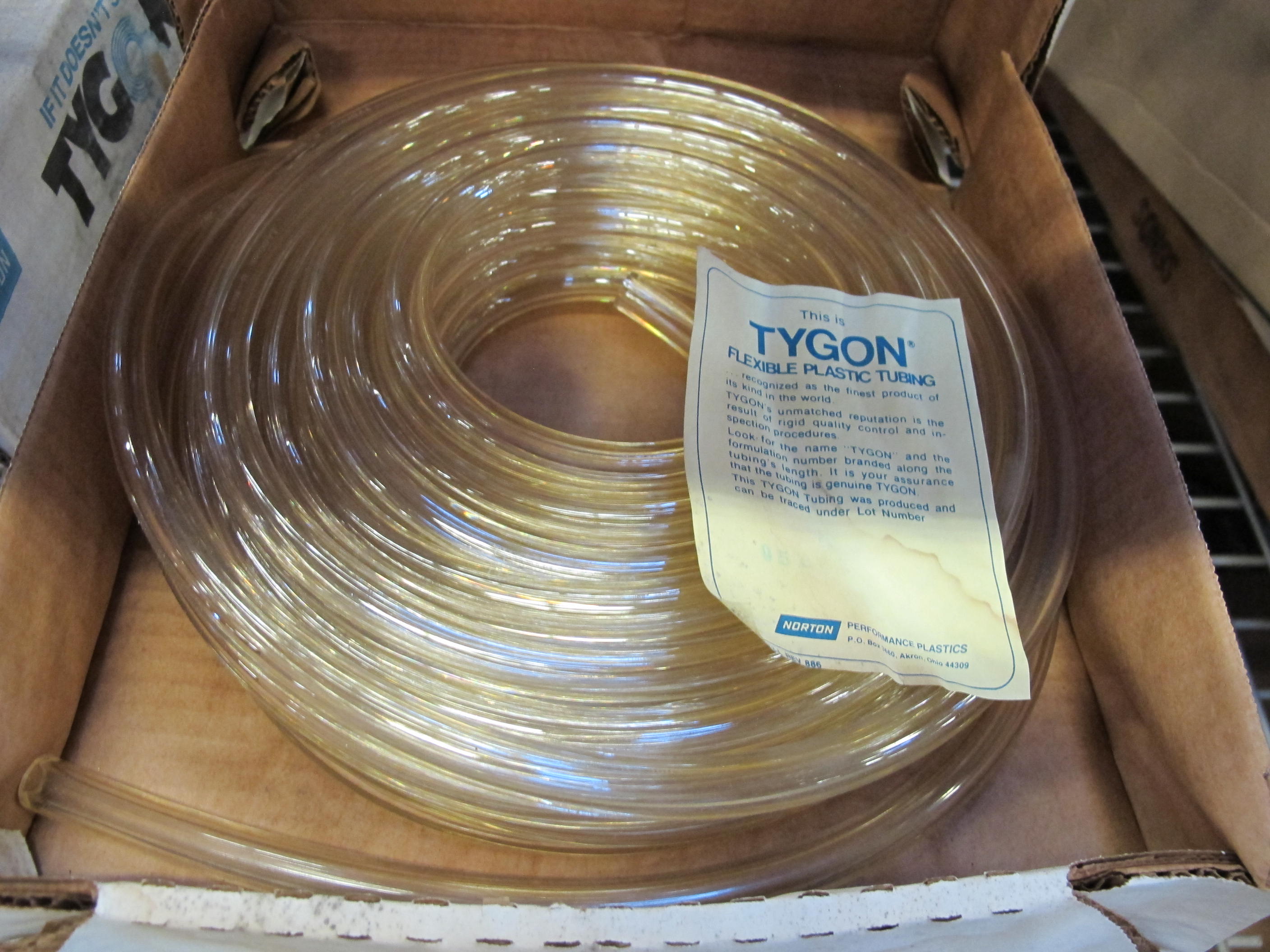 (17 BOXES) TYGON TUBING, 1/4" ID X 1/2" OD X 100' SIZE, CLEAR PVC MATERIAL, FLEXIBLE KIND. 100 FEET PER BOX. LOADING & HANDLING FEE $15-4542
